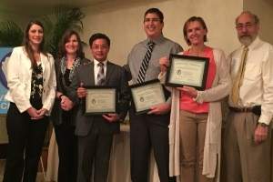 People accepting award